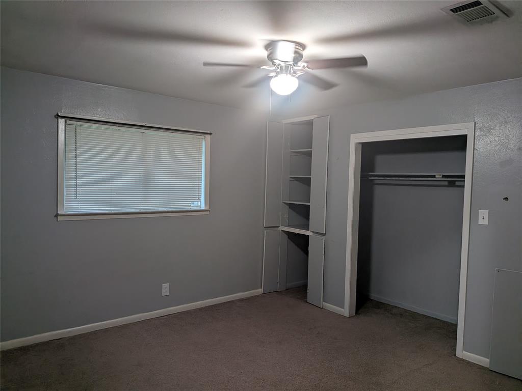 2009 County Road 4619 Athens, TX 75752 - Photo 23 of 36 a view of an empty room with a fan