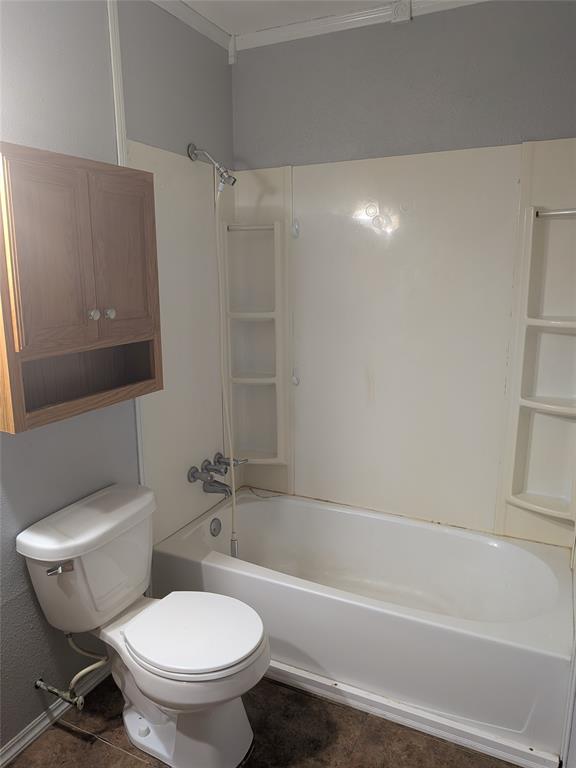 2009 County Road 4619 Athens, TX 75752 - Photo 26 of 36 a white toilet sitting next to a bath tub