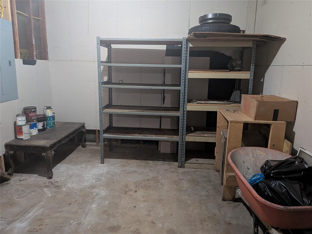2009 County Road 4619 Athens, TX 75752 - Photo 31 of 36 a living room with furniture and a fireplace