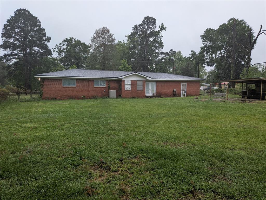 2009 County Road 4619 Athens, TX 75752 - Photo 5 of 36 a view of a house with a yard