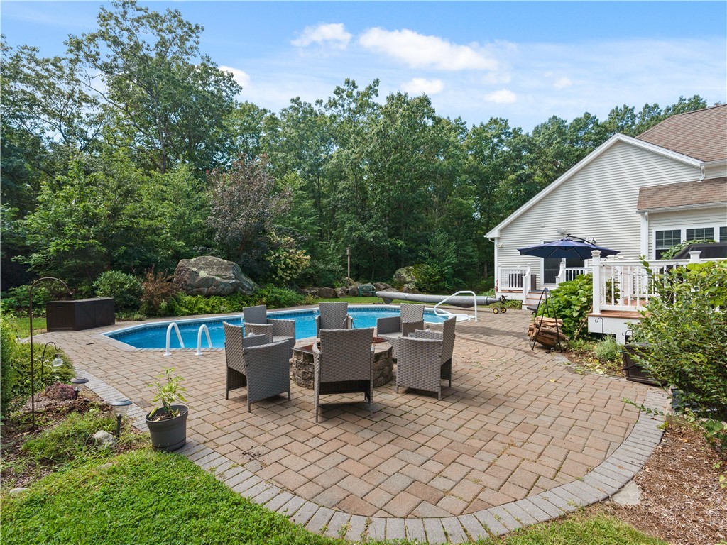 67 Rocky Hill Road Rehoboth, MA 02769 - Photo 6 of 45 Fire pit near heated pool