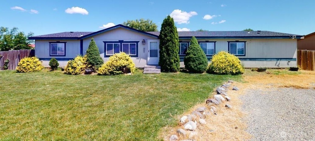 a view of a house with garden