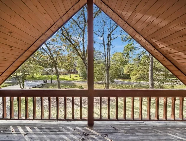a view of porch with a yard