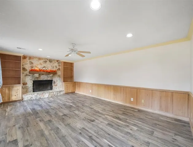 a view of kitchen and a fireplace