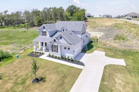 a view of a house with a ocean view