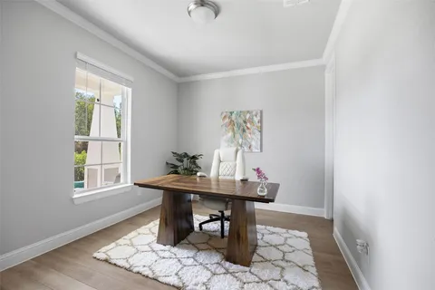 a workspace with furniture and window