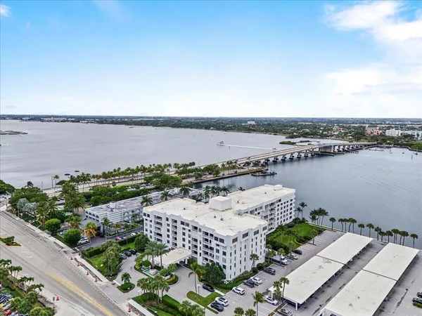 an aerial view of residential building and ocean