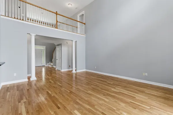a kitchen with granite countertop a sink a counter space appliances and cabinets