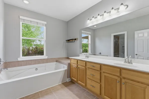 a bathroom with a toilet and shower