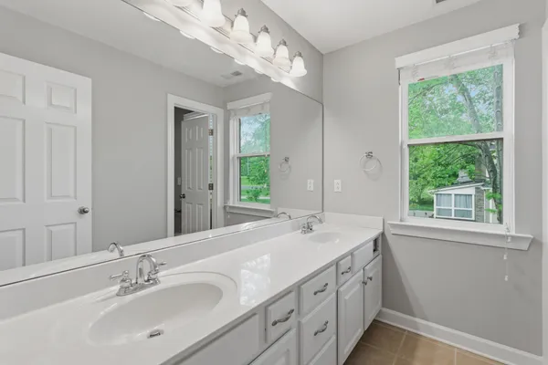 a bathroom with a toilet and a bathtub