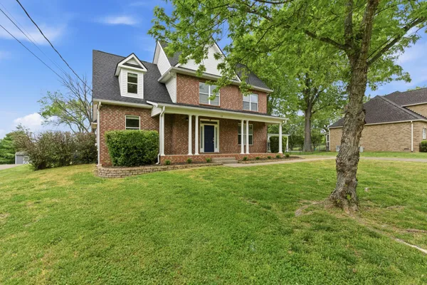 a front view of house with yard