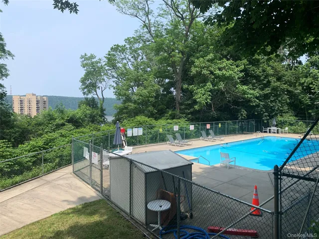 a view of a park with large trees