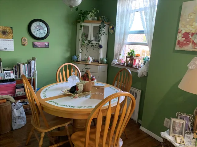 a kitchen with a refrigerator and a stove