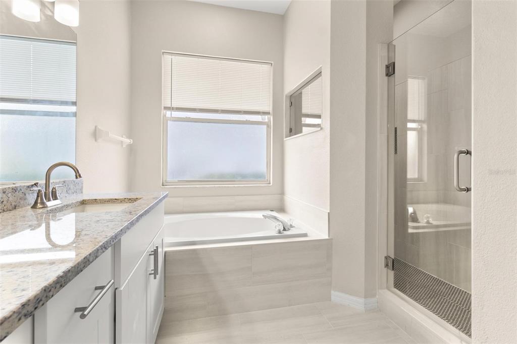 3023 Minuteman Lane Brandon, FL 33511 - Photo 12 of 34 a bathroom with a bathtub and a sink