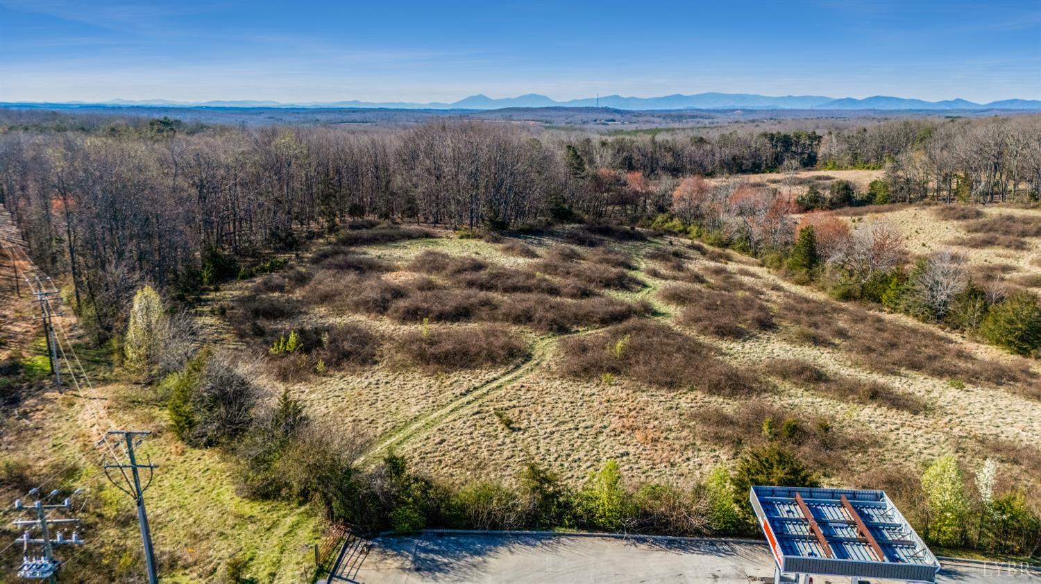 58 Wards Road Evington, VA 24550 - Photo 4 of 17 a view of a yard with wooden fence