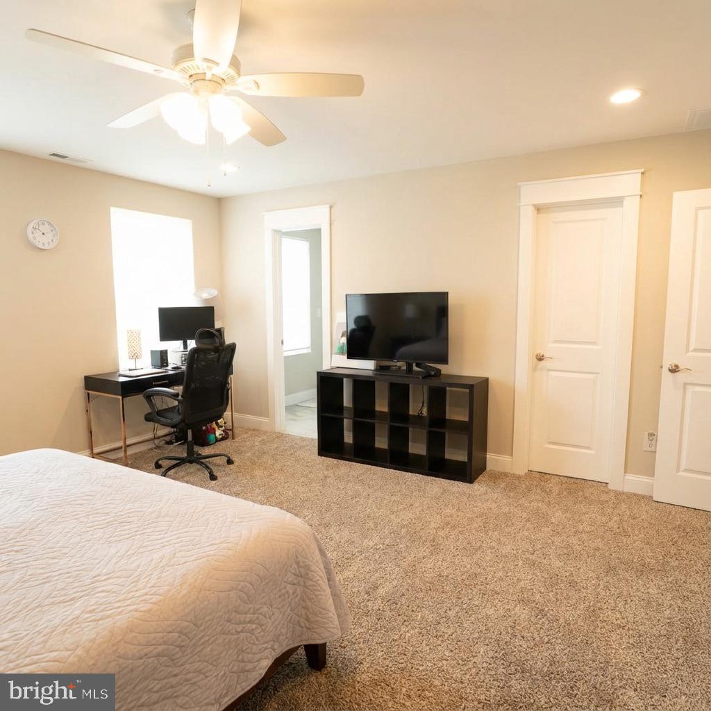 10 West Monroe Street Mount Holly, NJ 08060 - Photo 12 of 16 a room with a bed and furniture