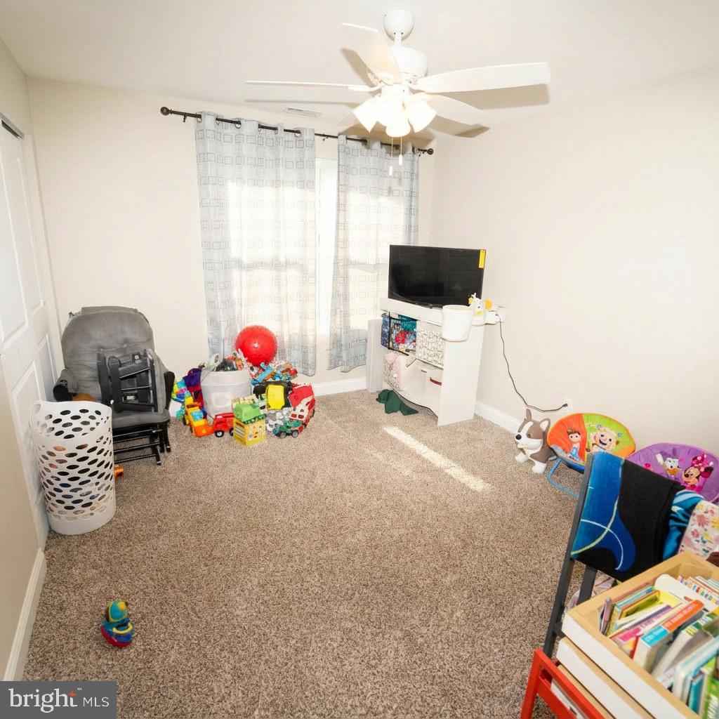 10 West Monroe Street Mount Holly, NJ 08060 - Photo 15 of 16 a room with toys and a couch