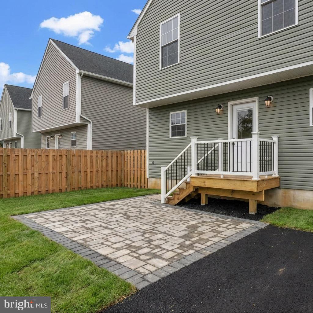 10 West Monroe Street Mount Holly, NJ 08060 - Photo 16 of 16 a backyard of a house with a bench