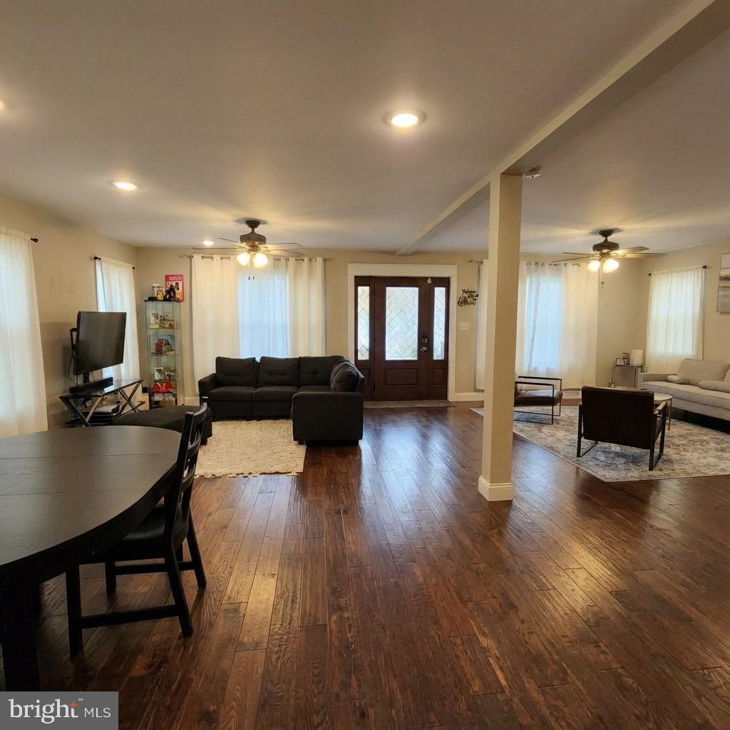 10 West Monroe Street Mount Holly, NJ 08060 - Photo 2 of 16 a view of a dining room with furniture wooden floor and a chandelier
