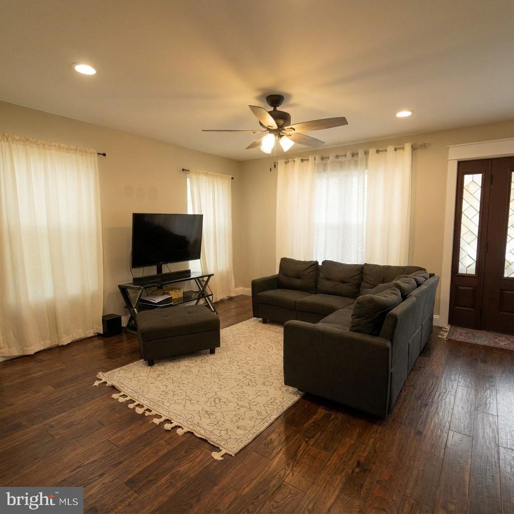 10 West Monroe Street Mount Holly, NJ 08060 - Photo 3 of 16 a living room with furniture and a flat screen tv