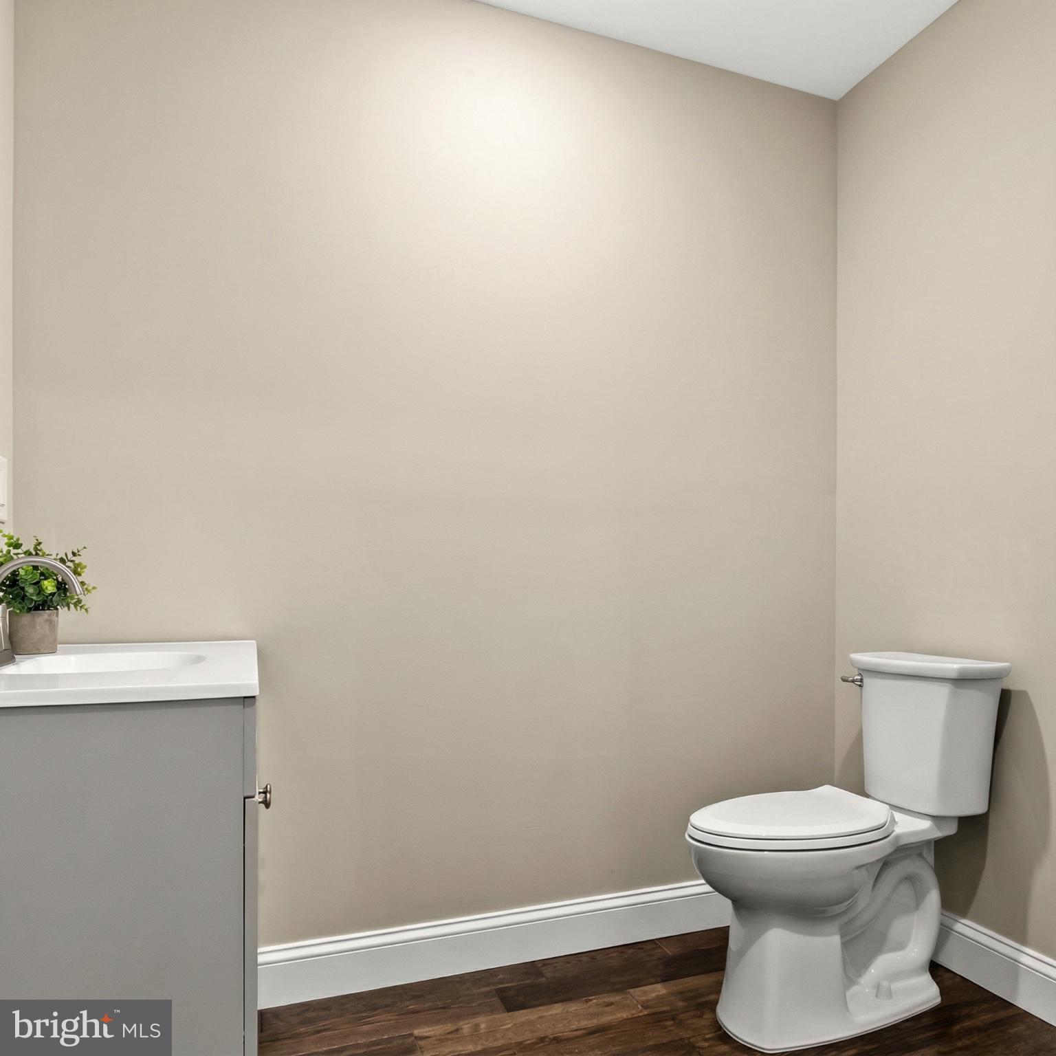 10 West Monroe Street Mount Holly, NJ 08060 - Photo 10 of 16 a bathroom with a toilet and a sink