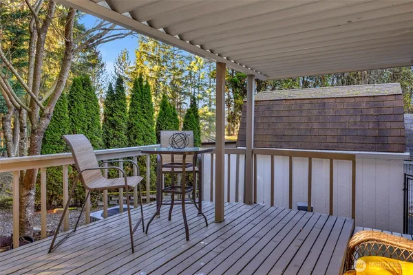 a view of a chairs on the roof deck