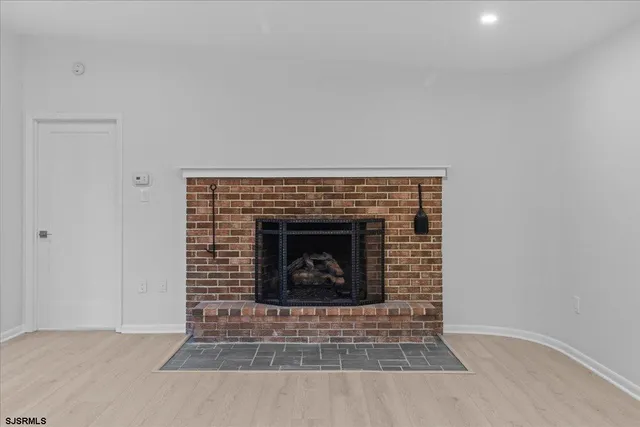 a living room with a fireplace