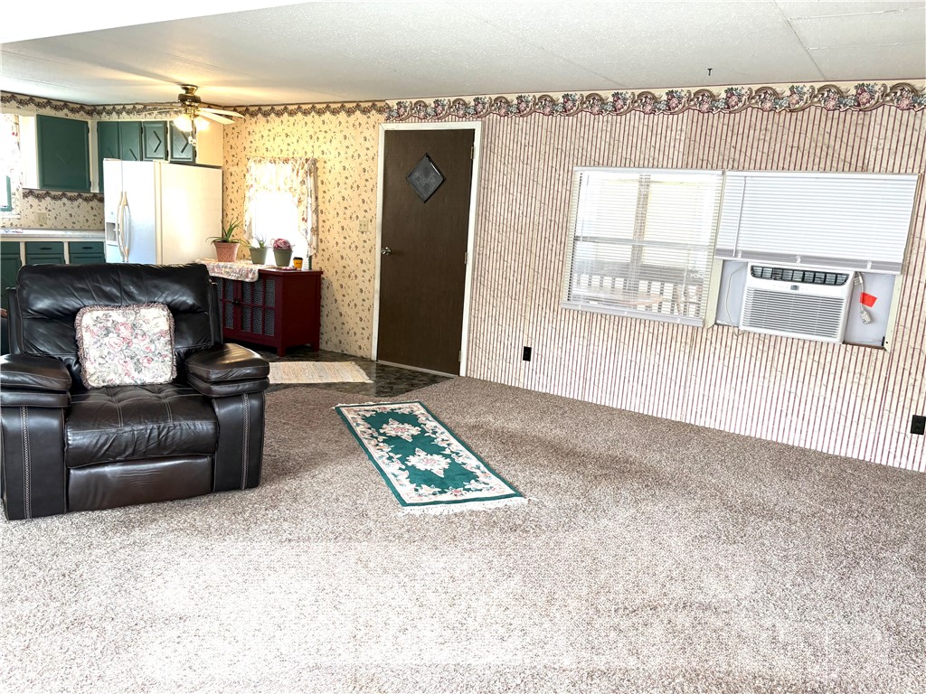 5434 North Waynesville Road, Unit 15 Oregonia, OH 45054 - Photo 11 of 19 This inviting space combines comfort and convenience, featuring a functional kitchen and a cozy living area.