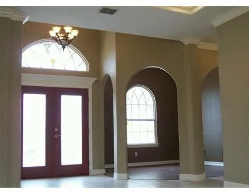 a view of a windows and a chandelier
