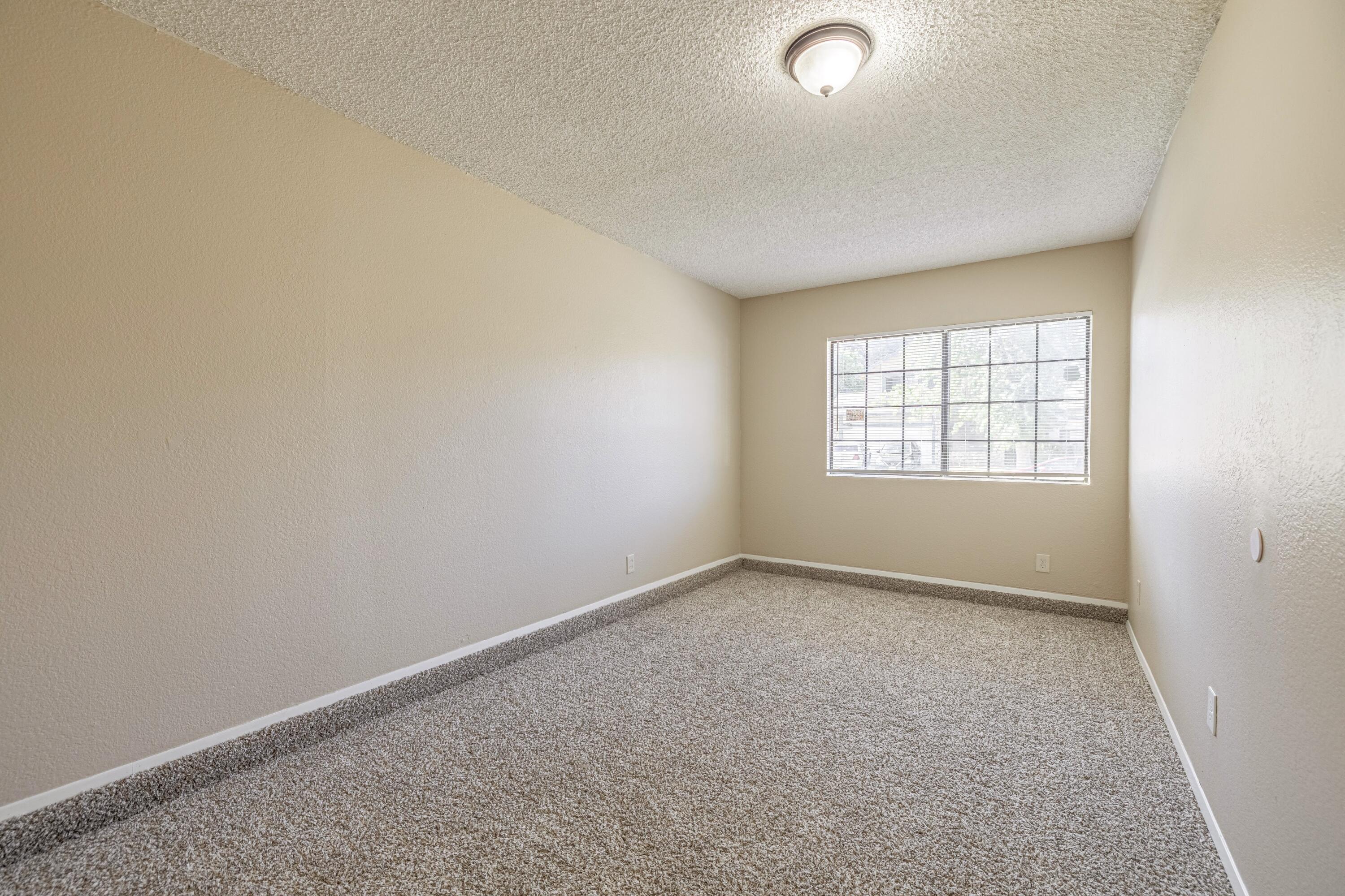 533 East Jackman Street Lancaster, CA 93535 - Photo 16 of 31 an empty room with windows