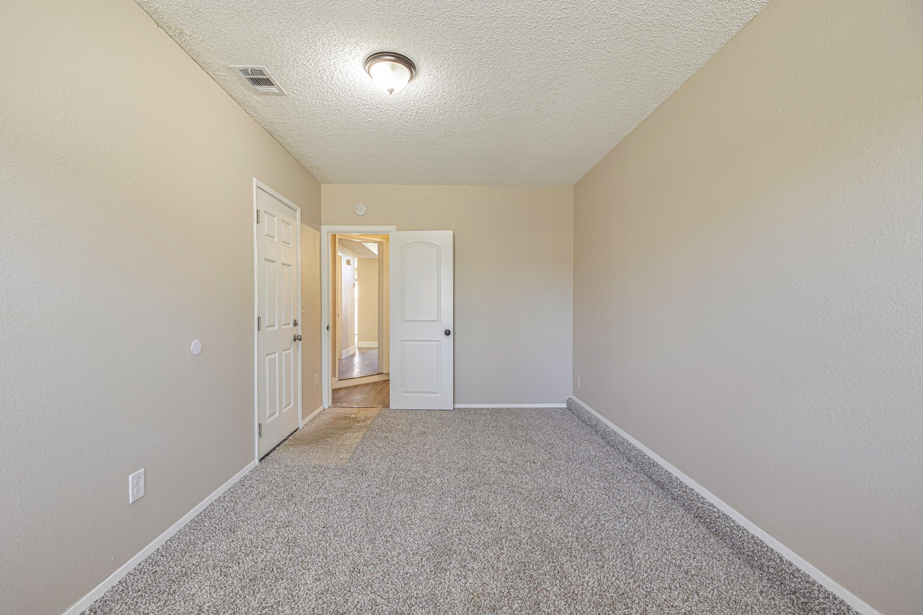 533 East Jackman Street Lancaster, CA 93535 - Photo 17 of 31 wooden floor in an empty room with a window
