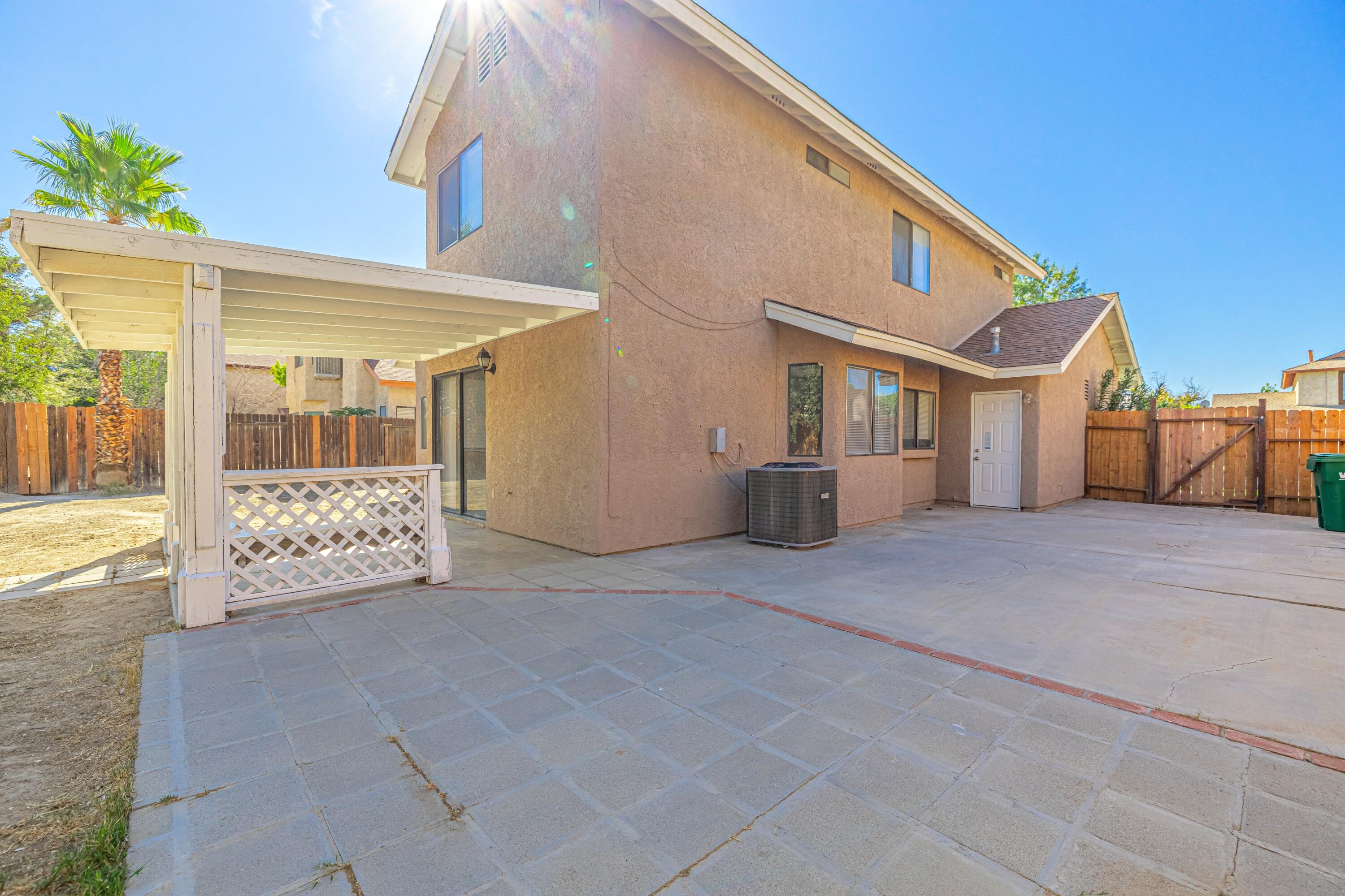 533 East Jackman Street Lancaster, CA 93535 - Photo 30 of 31 a view of a house with a outdoor space