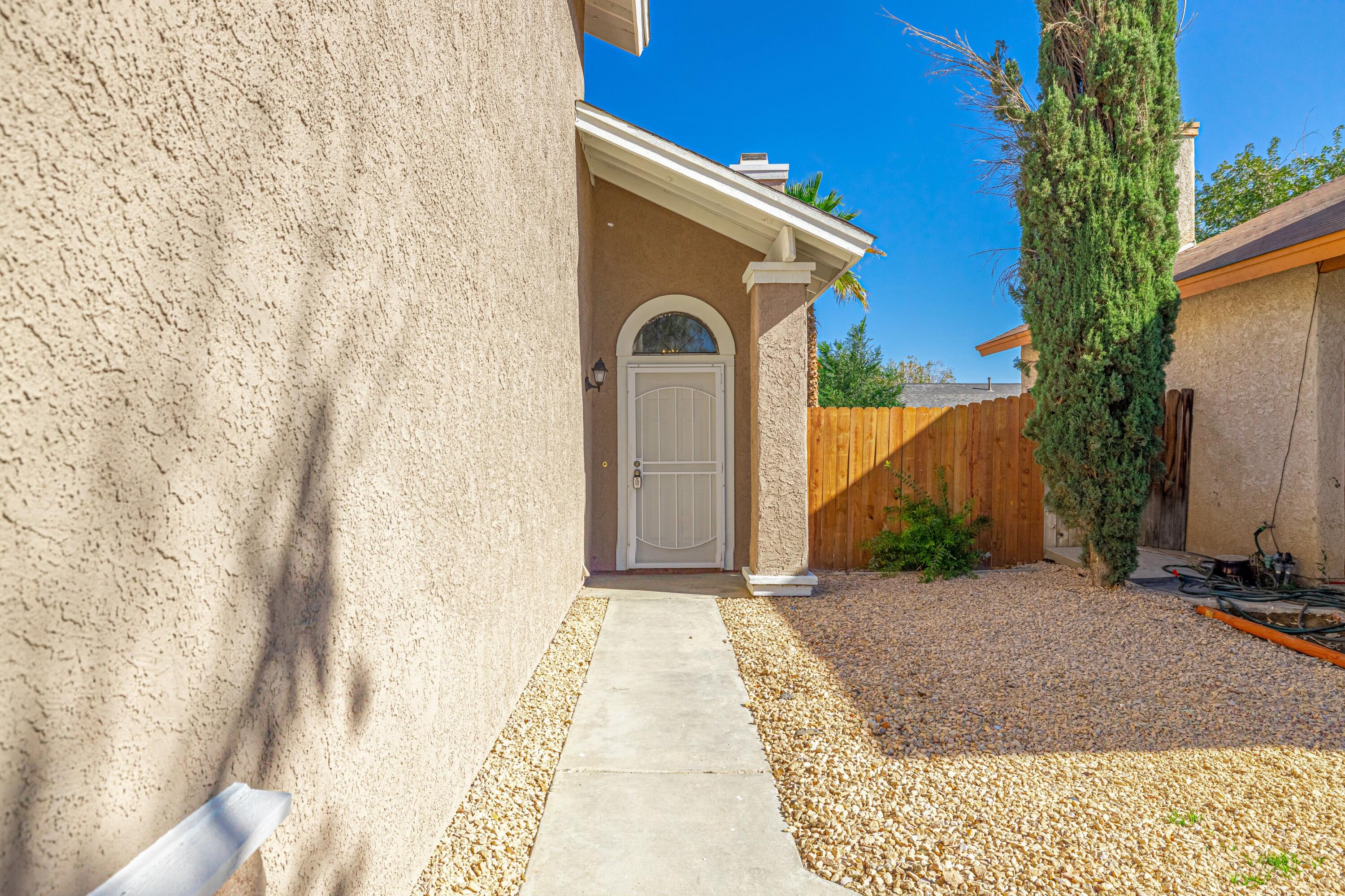 533 East Jackman Street Lancaster, CA 93535 - Photo 4 of 31 a front view of a house with a yard