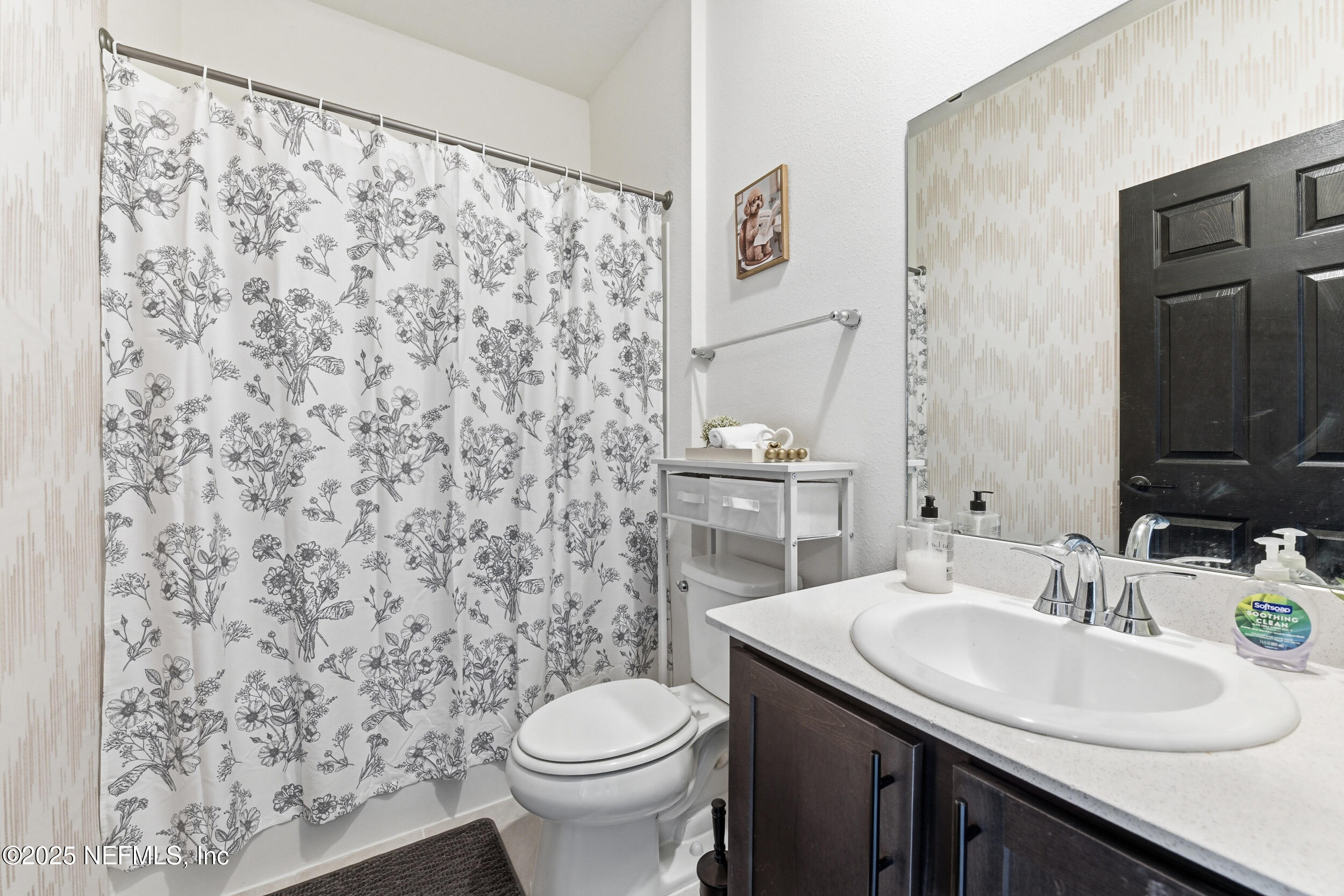 11183 Stapleton Drive Jacksonville, FL 32222 - Photo 18 of 43 a bathroom with a sink toilet and mirror