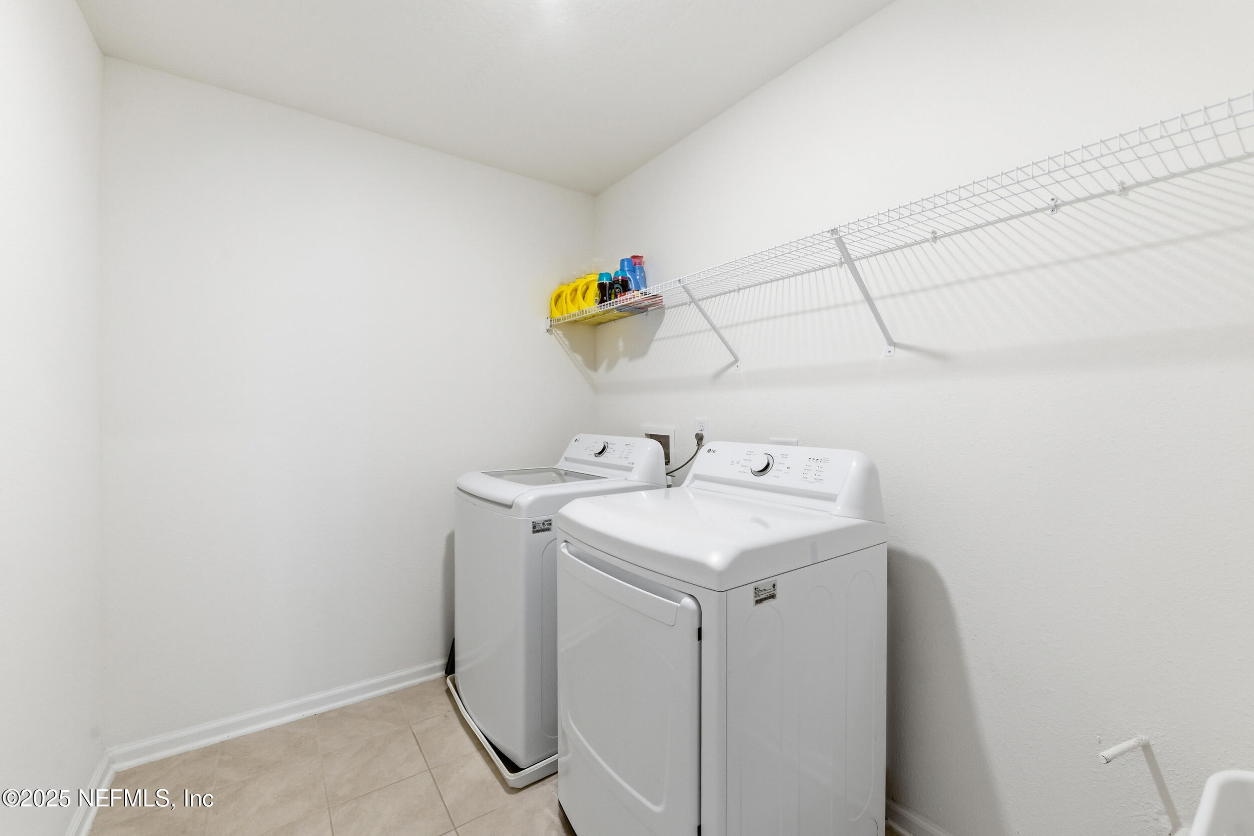 11183 Stapleton Drive Jacksonville, FL 32222 - Photo 24 of 43 a utility room with dryer and washer