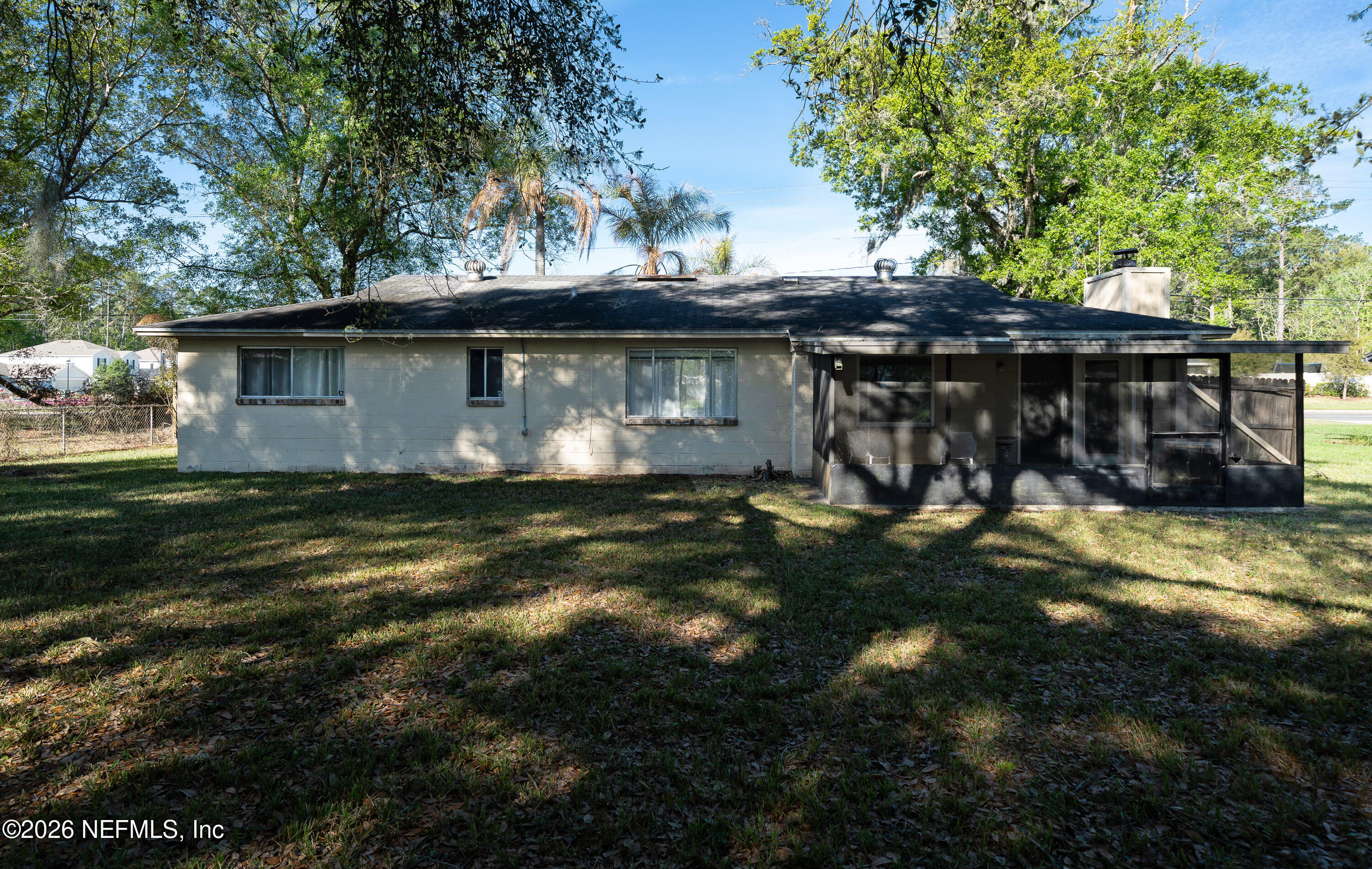 147 Knight Boxx Road Middleburg, FL 32068 - Photo 28 of 30 a view of a house with a yard