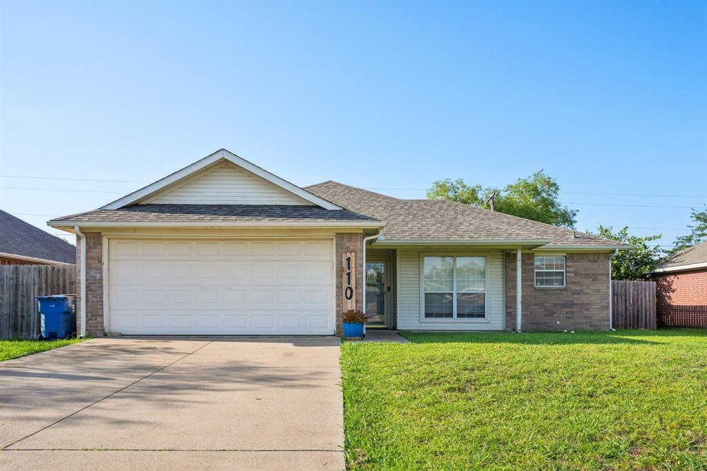 110 Apache Trail Alvarado, TX 76009 - Photo 1 of 1 a front view of a house with a yard and garage