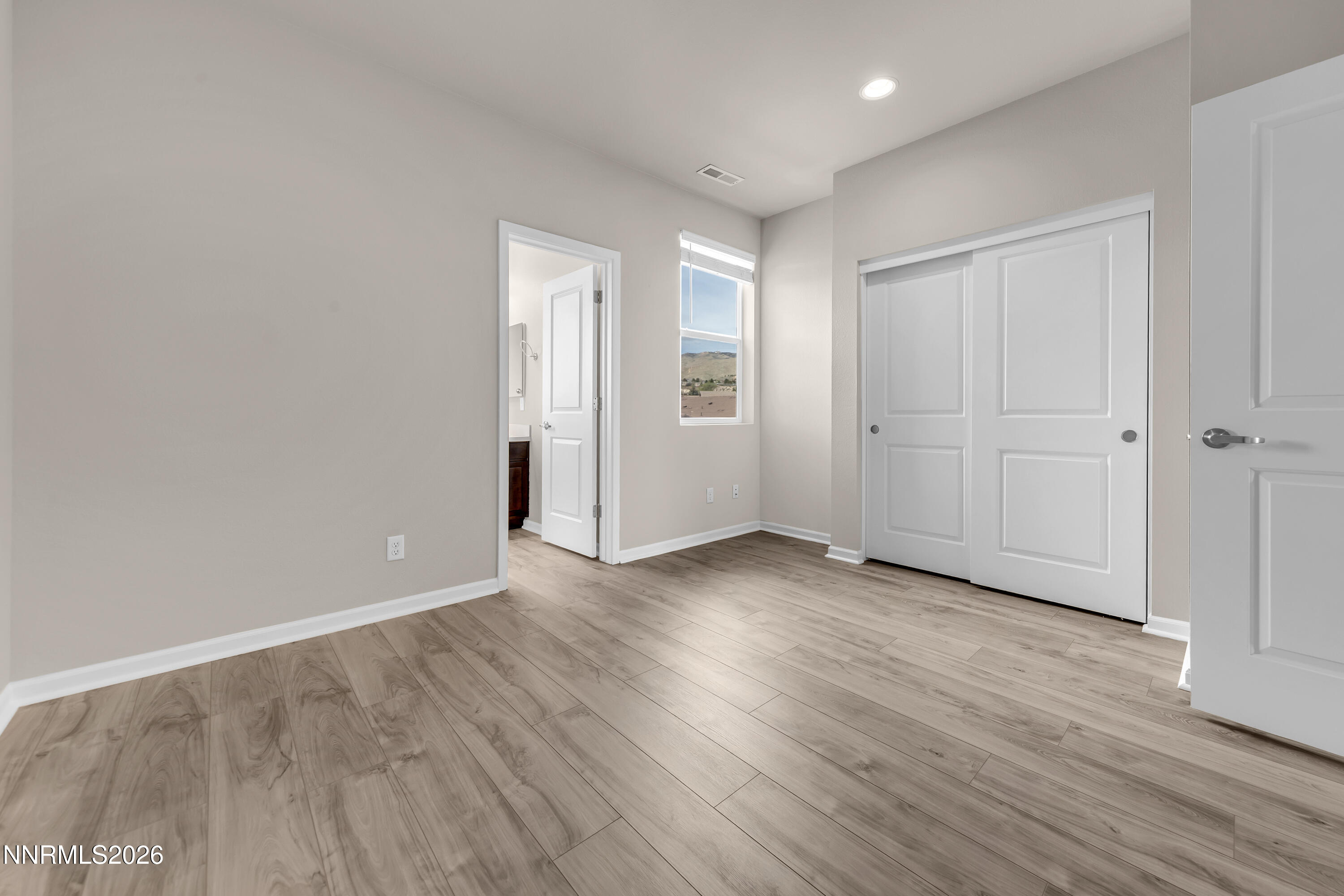 2150 Altamira Drive Reno, NV 89523 - Photo 15 of 21 a view of an empty room with wooden floor
