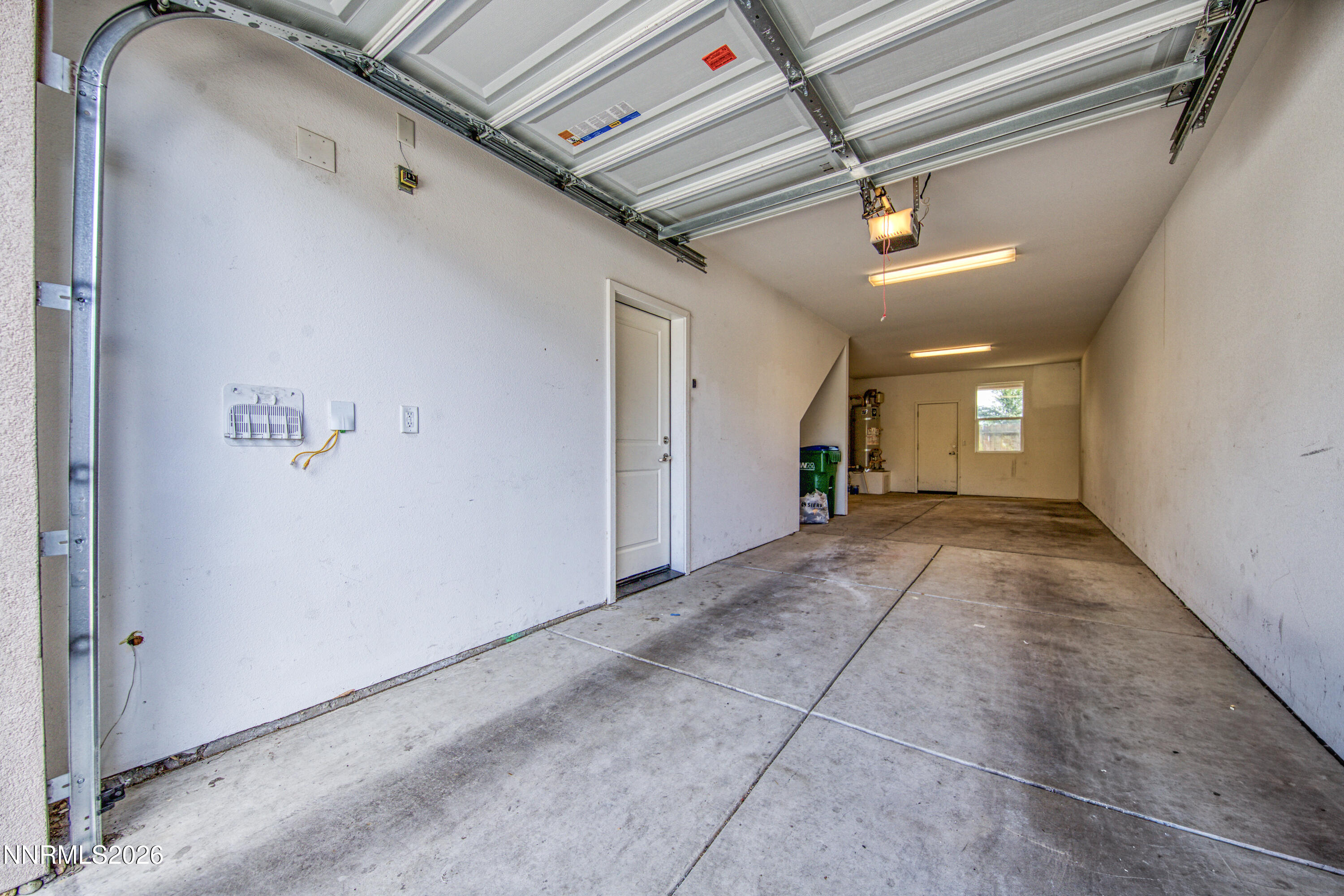 2150 Altamira Drive Reno, NV 89523 - Photo 21 of 21 a view of a hallway with wooden floor and a living room