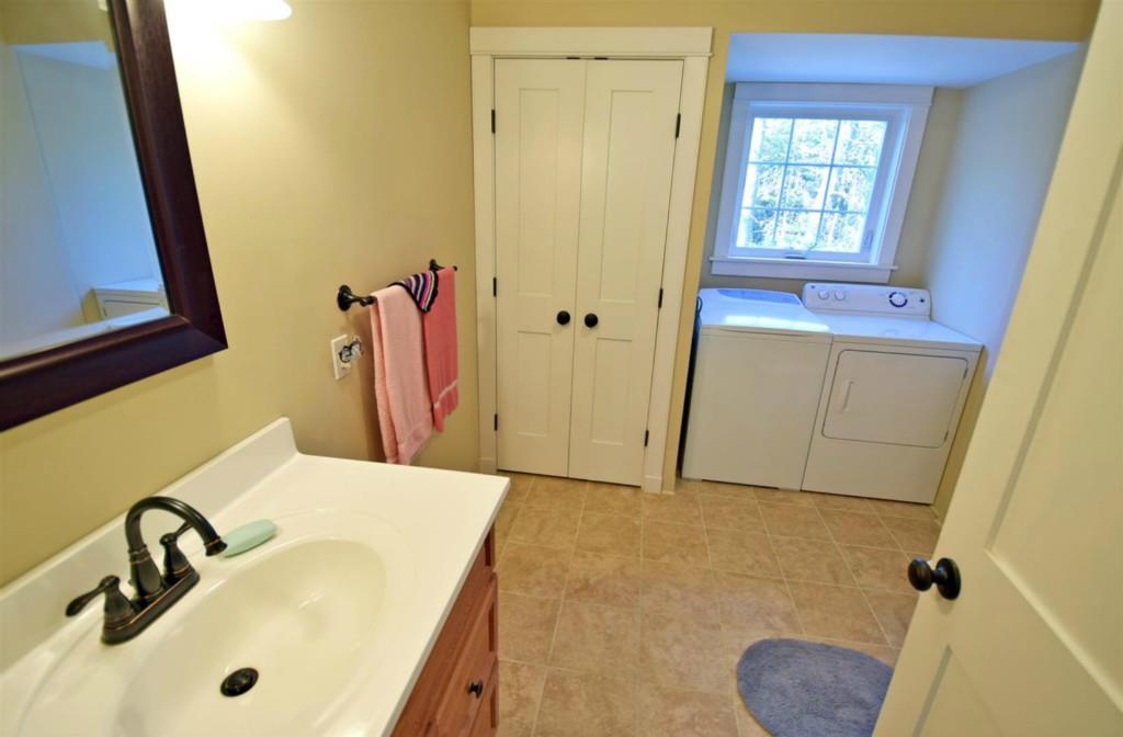 213 Tannery Brook Road Ellsworth, ME 04605 - Photo 18 of 35 The full bath has ceramic tile...