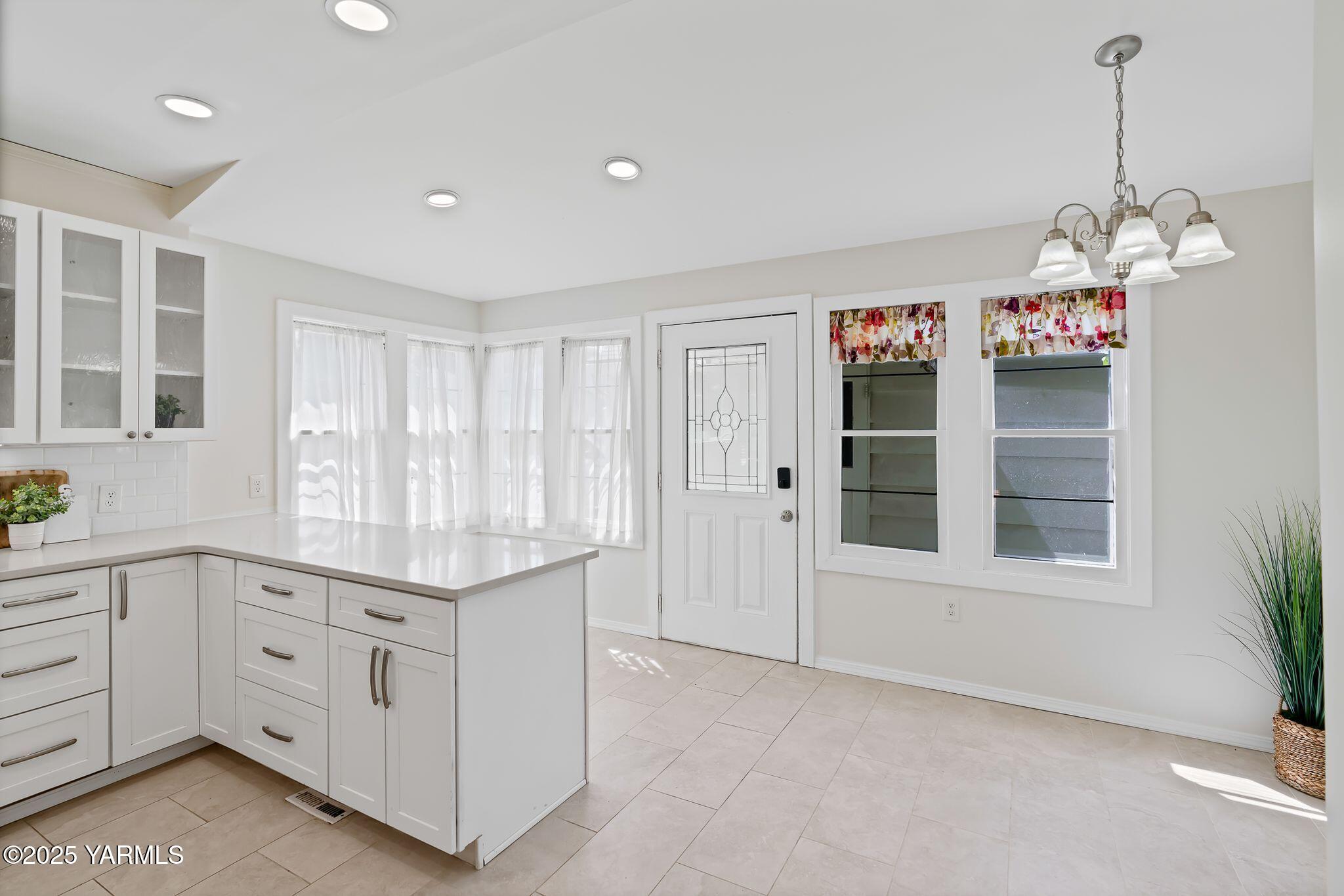 3310 Summitview Avenue Yakima, WA 98902 - Photo 12 of 39 a view of a kitchen with a sink and dishwasher cabinets