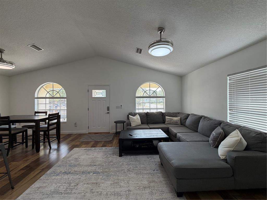 2723 West Arch Street Tampa, FL 33607 - Photo 3 of 14 a living room with furniture and a large window