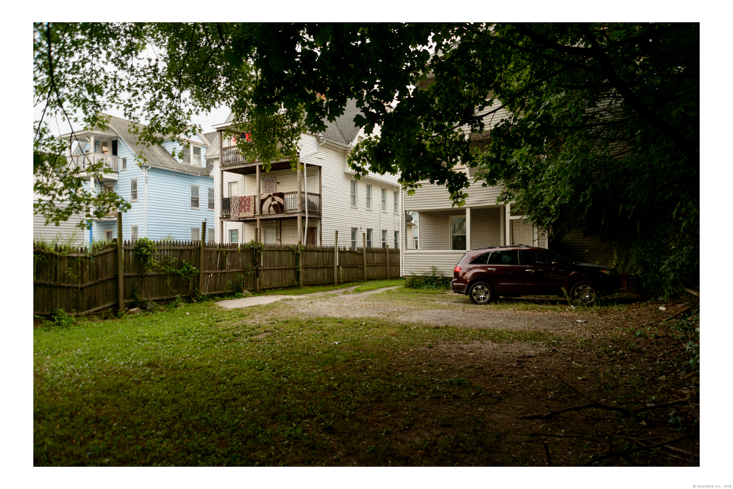 59 Ward Street, Unit 3 Waterbury, CT 06704 - Photo 19 of 19 a view of a house with backyard