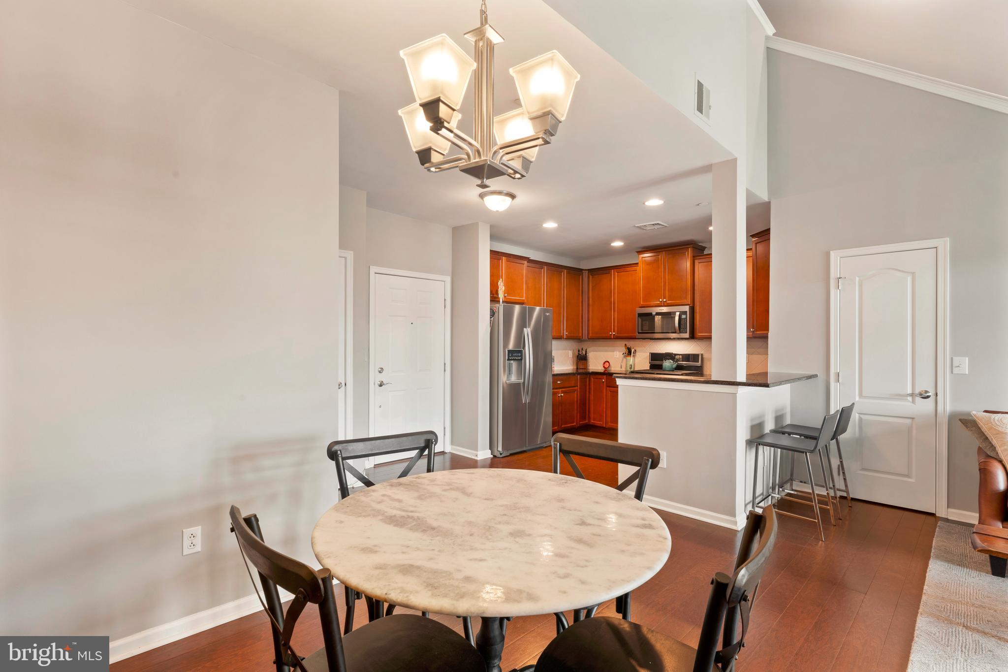 531 Carson Terrace Huntingdon Valley, PA 19006 - Photo 12 of 46 a view of a dining room with furniture and a chandelier