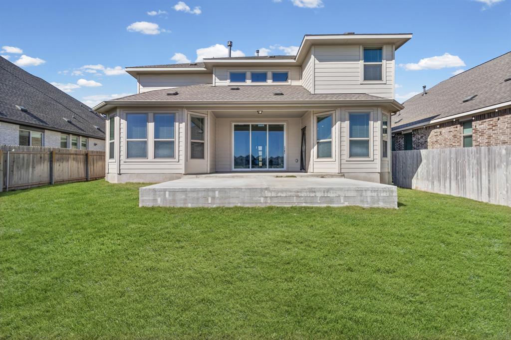 20520 Carries Ranch Road Pflugerville, TX 78660 - Photo 25 of 26 Back of property featuring a patio and a fenced backyard