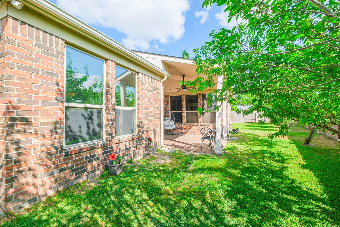 4718 Sedgewood Drive Rosenberg, TX 77471 - Photo 23 of 23 a garden view with a seating space