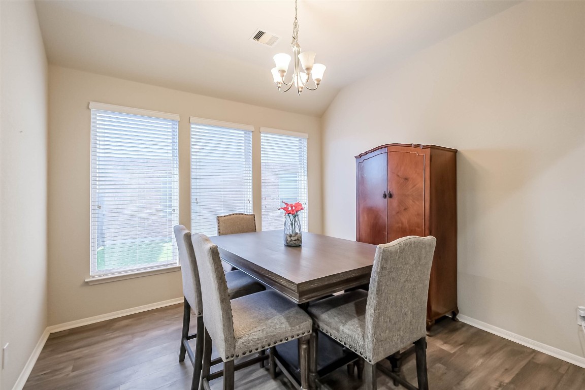 4718 Sedgewood Drive Rosenberg, TX 77471 - Photo 5 of 23 a view of a dining room with furniture window and wooden floor