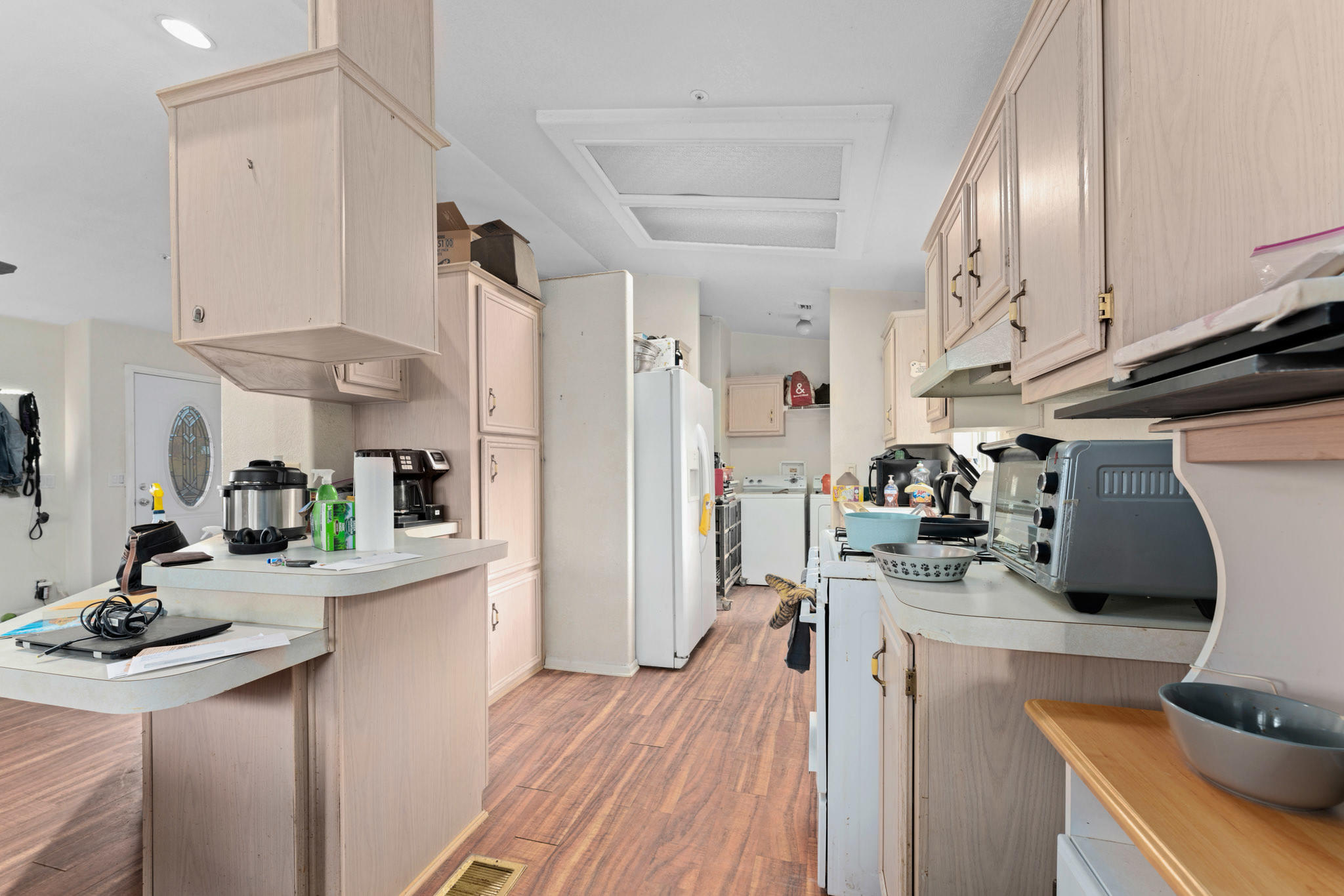 32035 Mountain Shadow Road Acton, CA 93510 - Photo 15 of 34 a kitchen with stainless steel appliances a sink a stove and refrigerator