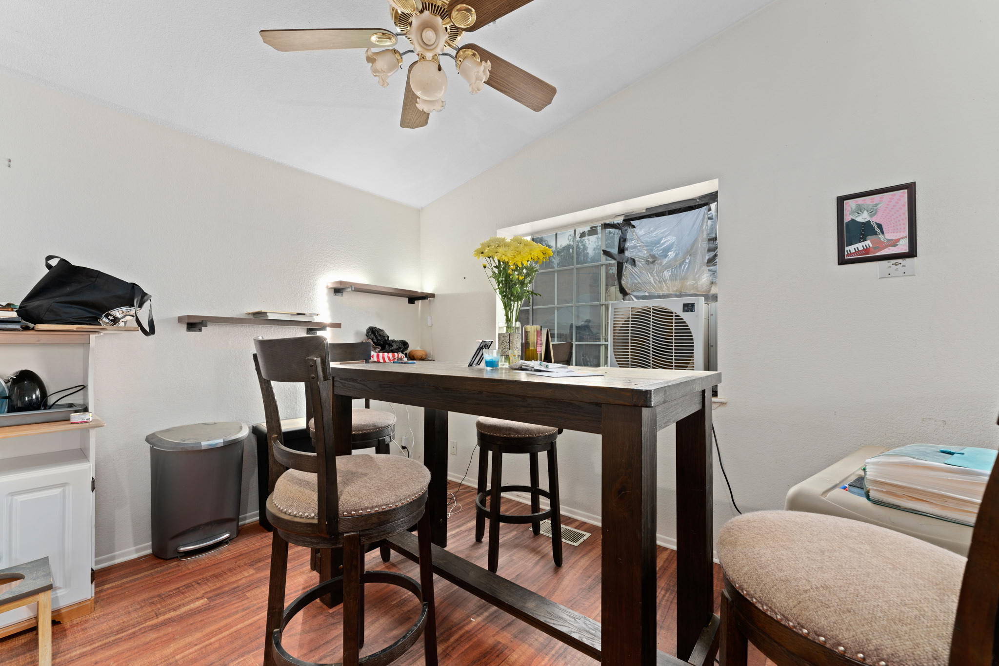 32035 Mountain Shadow Road Acton, CA 93510 - Photo 19 of 34 a view of a dining room with furniture and wooden floor