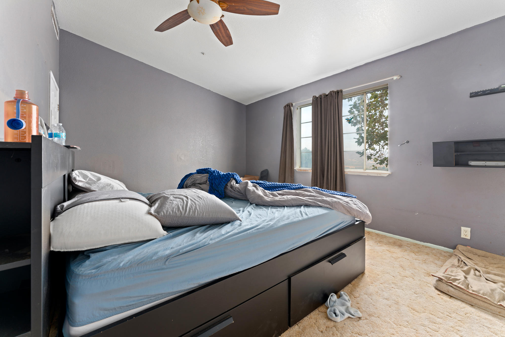 32035 Mountain Shadow Road Acton, CA 93510 - Photo 23 of 34 a bedroom with bed and window